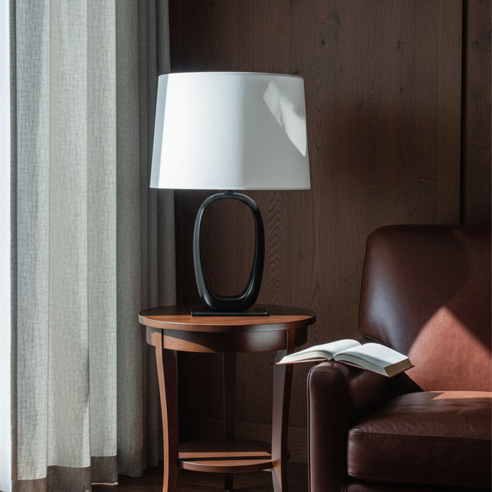 Hollow Silhouette, Gentle Glow — Sculptural Table Lamp for Refined Interiors