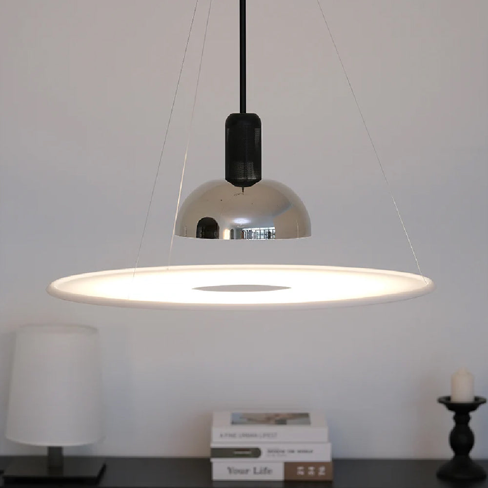 Gravity and weightlessness: Frisbi pendant lamp interprets the suspended aesthetics of modern space