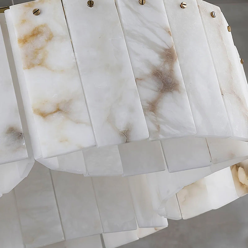Close view of the veined panels and brass fasteners on an Alabaster Modern Brass Ceiling Light