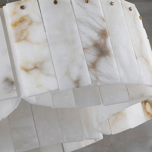Close view of the veined panels and brass fasteners on an Alabaster Modern Brass Ceiling Light