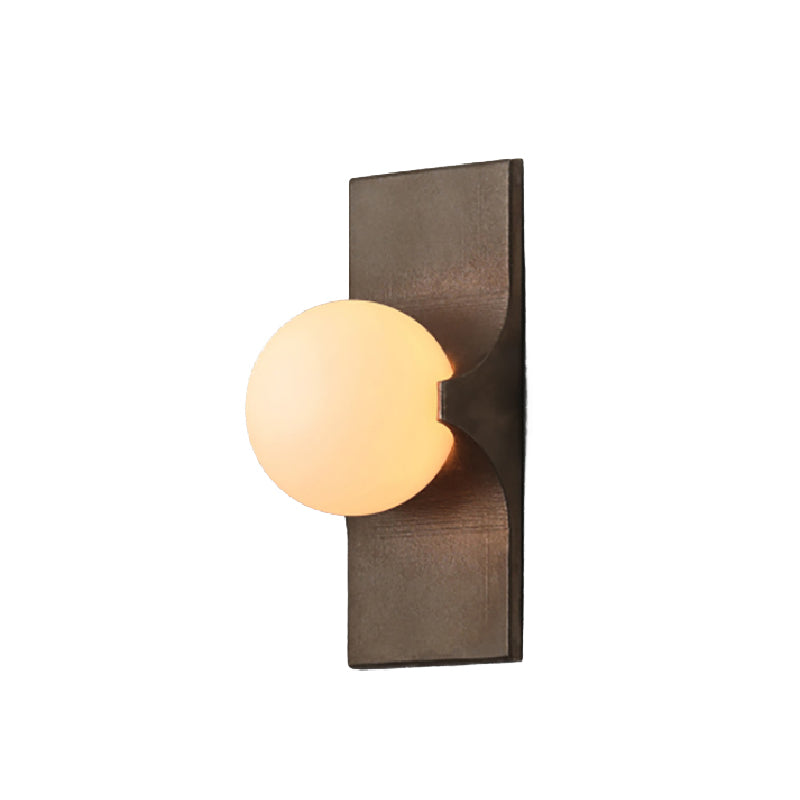Brass Alabaster Wall Light with a round glowing shade